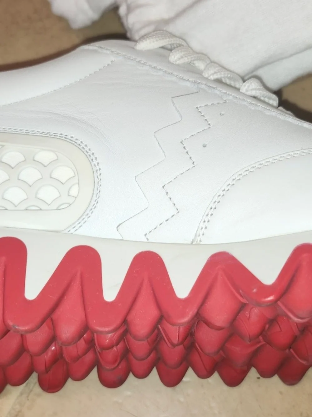 Christian Louboutin sleek white